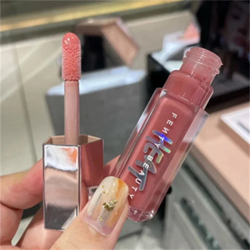 Fenty Beauty Lip Oil And Heat Lip Gloss